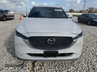 2024 Mazda CX-5 2.5 Turbo Signature with VIN JM3KFBXY7R0518304, listed as a Copart auction lot 42788985 with 8,593 mi miles and Salvage Title. Bid and sale history available at carsss.com. Image 5.