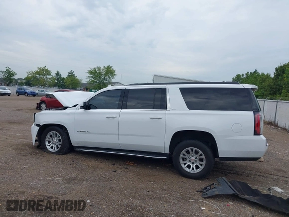 2019 GMC Yukon XL SLT with VIN 1GKS2GKC2KR369285, listed as a IAAI auction lot 40279008 with Not Provided miles and . Bid and sale history available at DreamBid. Image 14.
