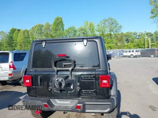 2022 Jeep Wrangler Unlimited Rubicon with VIN 1C4HJXFNXNW149063, listed as a IAAI auction lot 42130171 with 33,961 mi miles and . Bid and sale history available at DreamBid. Image 16.