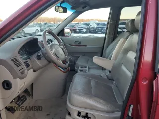 2005 Kia Sedona LX with VIN KNDUP132656725025, listed as a Copart auction lot 41702915 with 158,114 mi miles and Salvage Title. Bid and sale history available at carsss.com. Image 7.