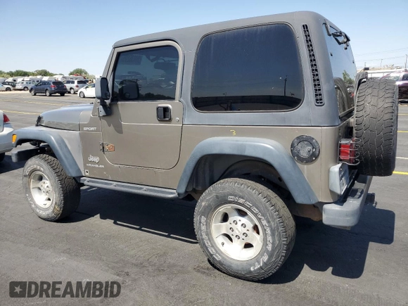 2003 Jeep Wrangler Sport z VIN 1J4FA49S43P327283, wystawiony jako Copart lot #59036295 z przebiegiem 158 108 mil mil oraz Szkoda całkowita • Salvage title. Historia ofert i sprzedaży dostępna na DreamBid. Obrazek 2.