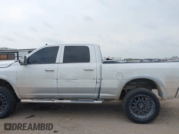 2016 Ram 2500 Laramie with VIN 3C6UR5FLXGG330005, listed as a IAAI auction lot 42045277 with 210,480 mi miles and . Bid and sale history available at DreamBid. Image 14.