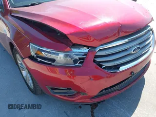 2014 Ford Taurus SEL with VIN 1FAHP2E86EG186642, listed as a IAAI auction lot 41901768 with 106,057 mi miles. Bid and sale history available at carsss.com. Image 6.