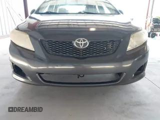 2009 Toyota Corolla with VIN JTDBL40E69J036916, listed as a IAAI auction lot 41776387 with 185,749 mi miles. Bid and sale history available at carsss.com. Image 6.
