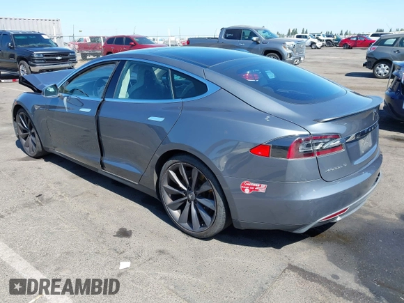 2014 Tesla Model S 60 with VIN 5YJSA1H19EFP36971, listed as a IAAI auction lot 42525811 with Not provided miles and . Bid and sale history available at DreamBid. Image 3.