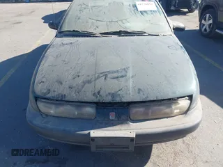 1998 Saturn SL with VIN 1G8ZF5287WZ294842, listed as a IAAI auction lot 41726012 with 170,385 mi miles. Bid and sale history available at carsss.com. Image 6.
