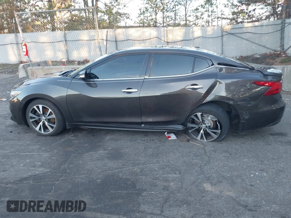 2016 Nissan Maxima Platinum with VIN 1N4AA6AP9GC405420, listed as a IAAI auction lot 41121830 with 59,680 mi miles and . Bid and sale history available at DreamBid. Image 14.