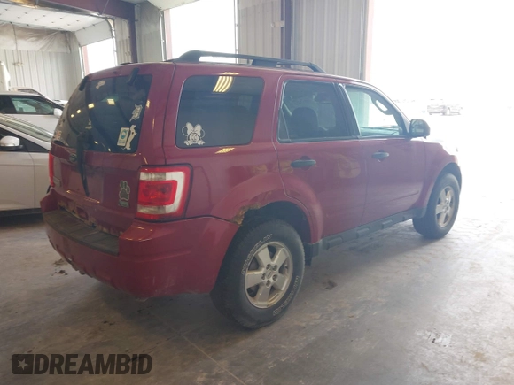 2010 Ford Escape XLT z VIN 1FMCU9DG6AKA55826, wystawiony jako IAAI lot #42337473 z przebiegiem 225 944 mil mil oraz . Historia ofert i sprzedaży dostępna na DreamBid. Obrazek 4.