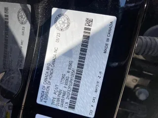 2023 Honda Civic Sport z VIN 2HGFE2F50PH108541, wystawiony jako Copart lot #53641295 z przebiegiem 27 991 mil mil oraz Szkoda całkowita • Salvage title. Historia ofert i sprzedaży dostępna na DreamBid. Obrazek 11.