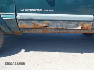 2000 Jeep Cherokee z VIN 1J4FF48S2YL253251, wystawiony jako IAAI lot #42243268 z przebiegiem 154 136 mil mil oraz . Historia ofert i sprzedaży dostępna na DreamBid. Obrazek 6.