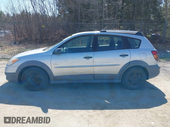 2007 Pontiac Vibe with VIN 5Y2SL65807Z427945, listed as a IAAI auction lot 42092638 with 230,417 mi miles. Bid and sale history available at carsss.com. Image 12.
