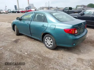 2009 Toyota Corolla z VIN 2T1BU40E39C031746, wystawiony jako IAAI lot #42542079 z przebiegiem 218 019 mil mil oraz . Historia ofert i sprzedaży dostępna na DreamBid. Obrazek 3.
