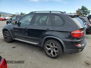 2011 BMW X5 35i z VIN 5UXZV4C59BL741822, wystawiony jako Copart lot #47702585 z przebiegiem 199 314 mil mil oraz Czysty tytuł • Clean title. Historia ofert i sprzedaży dostępna na DreamBid. Obrazek 2.