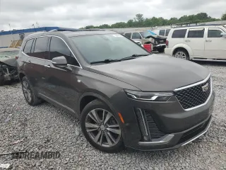 2020 Cadillac XT6 FWD Premium Luxury with VIN 1GYKPCRS4LZ133123, listed as a Copart auction lot 59411115 with 64,463 mi miles and Salvage title. Bid and sale history available at DreamBid. Image 4.