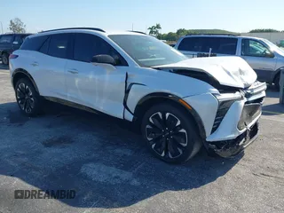 2024 Chevrolet Blazer EV eAWD RS z VIN 3GNKDCRJ6RS185260, wystawiony jako IAAI lot #41277933 z przebiegiem 5664 mil mil oraz . Historia ofert i sprzedaży dostępna na DreamBid. Obrazek 1.