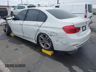 2016 BMW 3 Series 328i with VIN WBA8E9G5XGNT86382, listed as a IAAI auction lot 42056602 with 149,452 mi miles. Bid and sale history available at carsss.com. Image 3.