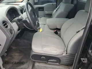2007 Ford F-150 XL with VIN 1FTRF12207KD50317, listed as a Copart auction lot 58611805 with 122,940 mi miles and Salvage title. Bid and sale history available at DreamBid. Image 7.
