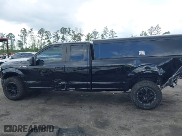 2018 Ford F-150 XL with VIN 1FTEX1CP9JKD23856, listed as a IAAI auction lot 41929088 with 62,747 mi miles and . Bid and sale history available at DreamBid. Image 14.