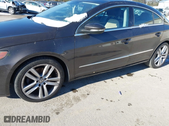 2013 Volkswagen CC Lux with VIN WVWRP7ANXDE522469, listed as a IAAI auction lot 41413025 with 115,117 mi miles. Bid and sale history available at carsss.com. Image 6.