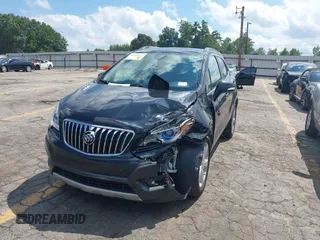 2016 Buick Encore with VIN KL4CJASB8GB662304, listed as a IAAI auction lot 38431076 with 118,383 mi miles. Bid and sale history available at carsss.com. Image 2.