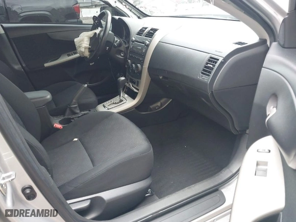 2010 Toyota Corolla with VIN 1NXBU4EE9AZ311991, listed as a IAAI auction lot 41735774 with 117,923 mi miles. Bid and sale history available at carsss.com. Image 5.