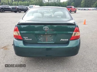 2003 Toyota Prius z VIN JT2BK18U330070749, wystawiony jako Copart lot #57949375 z przebiegiem Nie podano mil oraz Szkoda całkowita • Salvage title. Historia ofert i sprzedaży dostępna na DreamBid. Obrazek 6.