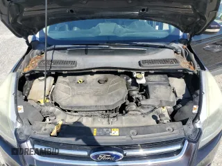 2013 Ford Escape Titanium z VIN 1FMCU0J93DUB60916, wystawiony jako Copart lot #61692595 z przebiegiem 169 691 mil mil oraz Szkoda całkowita • Salvage title. Historia ofert i sprzedaży dostępna na DreamBid. Obrazek 12.