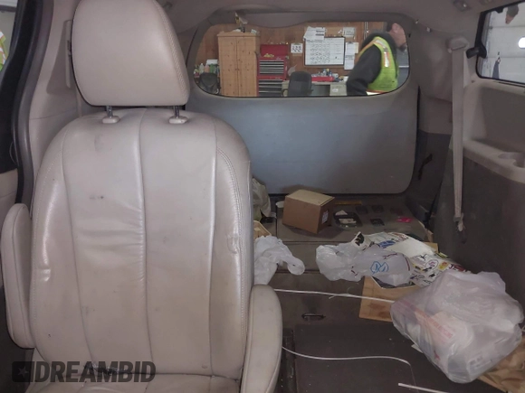 2011 Toyota Sienna XLE AAS with VIN 5TDYK3DC8BS111639, listed as a IAAI auction lot 42108488 with 300,872 mi miles and . Bid and sale history available at DreamBid. Image 8.