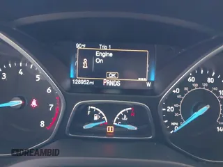 2017 Ford Focus Titanium z VIN 1FADP3N2XHL288103, wystawiony jako IAAI lot #42573844 z przebiegiem 128 952 mil mil oraz . Historia ofert i sprzedaży dostępna na DreamBid. Obrazek 7.