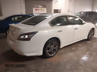2014 Nissan Maxima SV z VIN 1N4AA5APXEC478724, wystawiony jako IAAI lot #41335407 z przebiegiem 161 985 mil mil oraz . Historia ofert i sprzedaży dostępna na DreamBid. Obrazek 4.