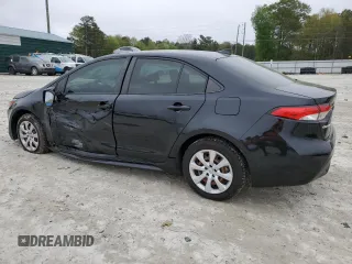 2021 Toyota Corolla LE with VIN JTDEPMAEXMJ154556, listed as a Copart auction lot 51620095 with 179,738 mi miles and Salvage Title. Bid and sale history available at carsss.com. Image 2.