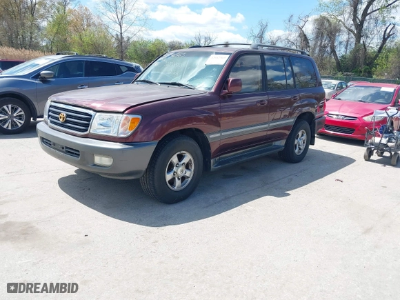 2002 Toyota Land Cruiser with VIN JTEHT05J422022565, listed as a IAAI auction lot 42042565 with 550,000 mi miles. Bid and sale history available at carsss.com. Image 2.