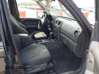 2003 Jeep Liberty Sport with VIN 1J4GL48KX3W530569, listed as a IAAI auction lot 41857397 with 172,303 mi miles. Bid and sale history available at carsss.com. Image 5.