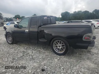 2003 Ford F-150 XL with VIN 1FTRX07243KD13281, listed as a Copart auction lot 59639315 with 257,545 mi miles and Clean title. Bid and sale history available at DreamBid. Image 2.