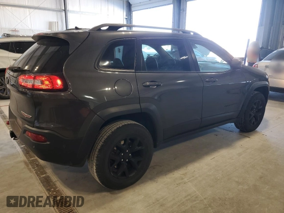 2015 Jeep Cherokee Trailhawk with VIN 1C4PJMBS5FW615845, listed as a Copart auction lot 52824635 with 134,873 mi miles and Salvage Title. Bid and sale history available at carsss.com. Image 3.