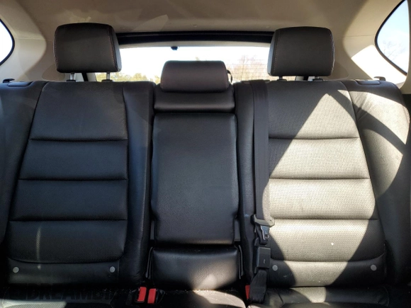 2014 Mazda CX-5 Grand Touring with VIN JM3KE4DY8E0421660, listed as a Copart auction lot 48588525 with 144,939 mi miles and Salvage Title. Bid and sale history available at DreamBid. Image 10.