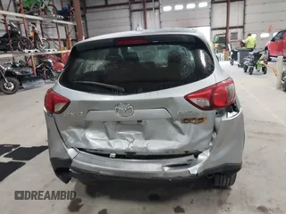 2016 Mazda CX-5 Sport with VIN JM3KE2BY2G0718434, listed as a IAAI auction lot 41961364 with 145,748 mi miles. Bid and sale history available at carsss.com. Image 16.