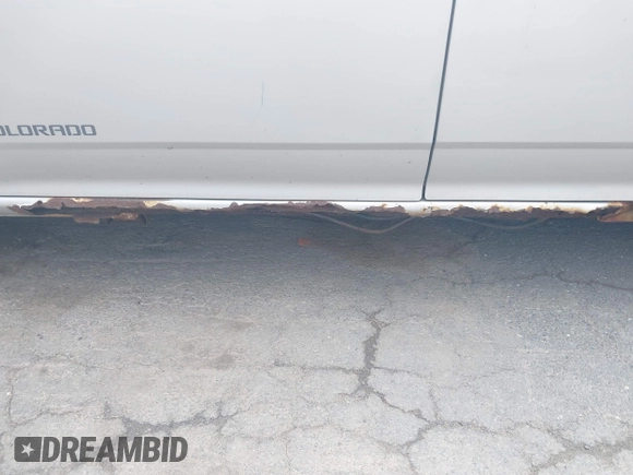 2005 Chevrolet Colorado LS ZQ8 with VIN 1GCCS196658105512, listed as a IAAI auction lot 42567652 with 221,852 mi miles and . Bid and sale history available at DreamBid. Image 6.