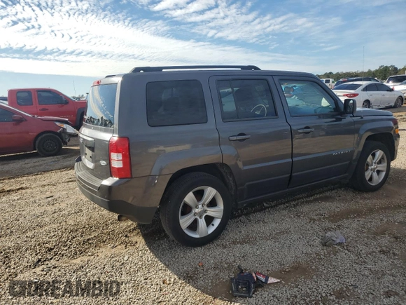 2015 Jeep Patriot Latitude with VIN 1C4NJPFBXFD281214, listed as a Copart auction lot 87883615 with 106,402 mi miles and Salvage Title. Bid and sale history available at DreamBid. Image 3.