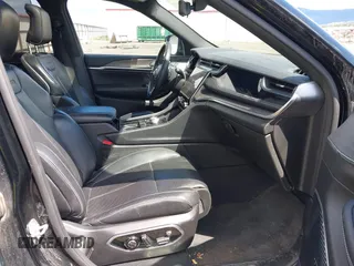 2023 Jeep Grand Cherokee Overland with VIN 1C4RJHDG2PC526889, listed as a IAAI auction lot 42247177 with 71,390 mi miles and . Bid and sale history available at DreamBid. Image 5.