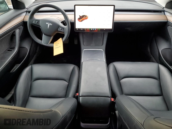 2023 Tesla Model 3 with VIN 5YJ3E1EA5PF484801, listed as a Copart auction lot 79766274 with 83,541 mi miles and Clean Title. Bid and sale history available at DreamBid. Image 8.