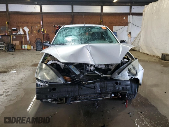 2003 Ford Focus SE z VIN 1FAFP34P43W186633, wystawiony jako Copart lot #56899065 z przebiegiem Nie podano mil oraz Szkoda całkowita • Salvage title. Historia ofert i sprzedaży dostępna na DreamBid. Obrazek 5.