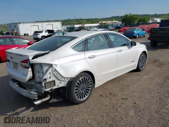 2017 Ford Fusion Hybrid Titanium с VIN 3FA6P0RU7HR148191, выставлен на аукционе IAAI как лот 42167708 с пробегом 72 708 миль миль и . История ставок и продаж доступна на DreamBid. Изображение 4.