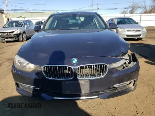 2015 BMW 3 Series 328i xDrive z VIN WBA3B5C55FF962857, wystawiony jako Copart lot #52691015 z przebiegiem 129 523 mil mil oraz Nie do naprawy • Non repairable. Historia ofert i sprzedaży dostępna na DreamBid. Obrazek 5.