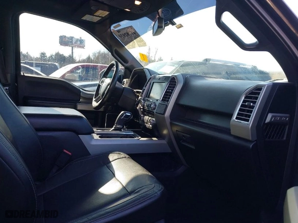2015 Ford F-150 XLT w/HD Payload Pkg with VIN 1FTFW1EG4FFC97087, listed as a IAAI auction lot 41282930 with 121,506 mi miles. Bid and sale history available at carsss.com. Image 5.