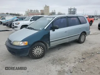 1997 Honda Odyssey with VIN JHMRA184XVC008354, listed as a Copart auction lot 44390495 with 246,841 mi miles and Salvage title. Bid and sale history available at DreamBid. Image 1.