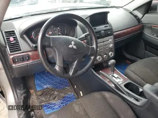 2012 Mitsubishi Galant ES z VIN 4A32B3FF0CE017630, wystawiony jako Copart lot #69928624 z przebiegiem 227 632 mil mil oraz Szkoda całkowita • Salvage title. Historia ofert i sprzedaży dostępna na DreamBid. Obrazek 8.