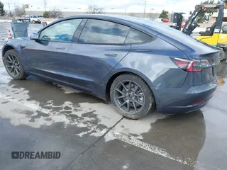 2022 Tesla Model 3 Long Range with VIN 5YJ3E1EB0NF259904, listed as a IAAI auction lot 41826642 with 42,272 mi miles and . Bid and sale history available at DreamBid. Image 3.
