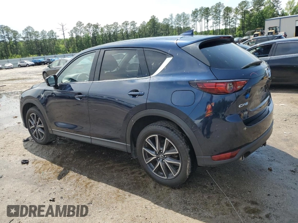 2018 Mazda CX-5 Grand Touring with VIN JM3KFADM3J1312519, listed as a Copart auction lot 56276685 with 109,486 mi miles and Clean title. Bid and sale history available at DreamBid. Image 2.