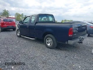 2003 Ford F-150 XL with VIN 1FTRX17223NB22897, listed as a IAAI auction lot 42166965 with 207,627 mi miles and . Bid and sale history available at DreamBid. Image 3.